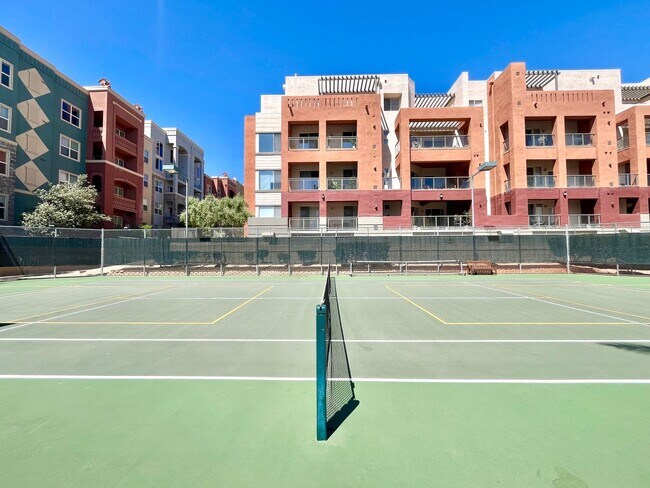 Building Photo - Spacious 2 Bedroom High-Rise Condo with Resort-Style Amenities & Oversized Balcony
