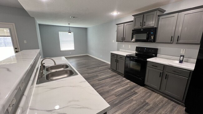 Building Photo - Move In Ready 4 Bedroom Home in Goodnight Ranch with Solar Panels!