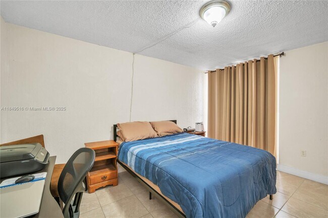 Building Photo - 10400 SW 108th Ave