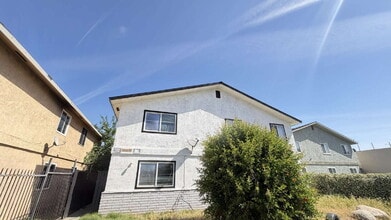 Building Photo - Spacious 3 Bed / 1 Bath Apartment with Open Layout & In-Unit Laundry