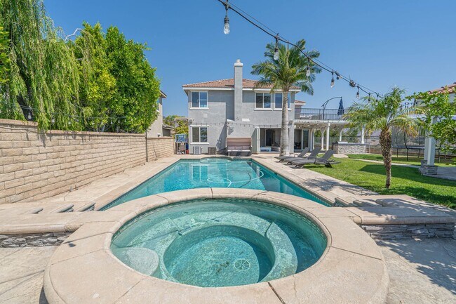 Building Photo - Spectacular 5-Bedroom Home with Pool, RV P...