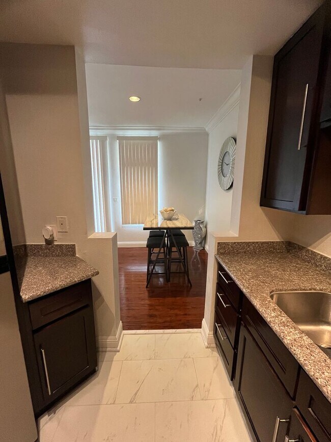 Building Photo - Meridian  Fully FURNISHED Condo with Strip...