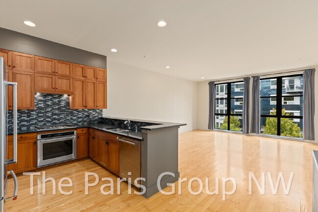 Building Photo - Exceptional 2 Story CapHill Condo * 2 Pkg Spaces, EV Charger & Rooftop Views