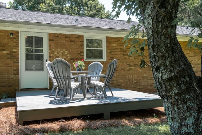 Building Photo - Classic brick rancher with carport and updated decor