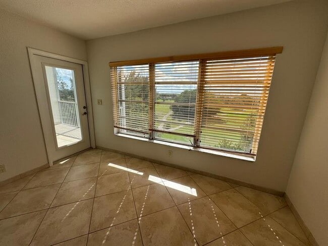 Building Photo - 3200 N Palm Aire Dr