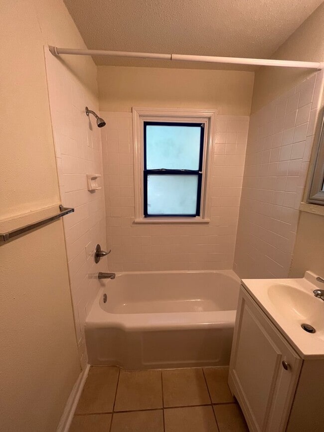 Building Photo - Bright & Spacious Studio Just Minutes from...