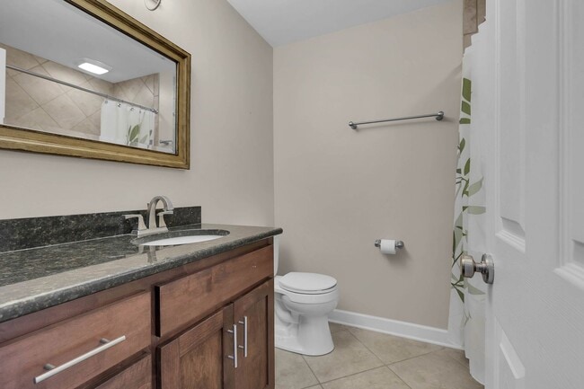 Building Photo - Beautiful and light-filled home in the desirable Normandy Place community located in Nashville’s ...