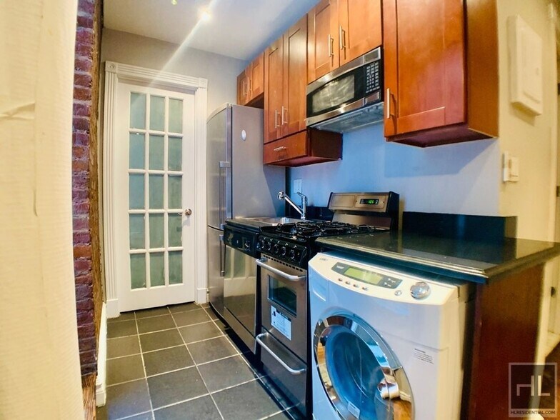 Building Photo - Renovated East Village 2-Bedroom with Sunl...