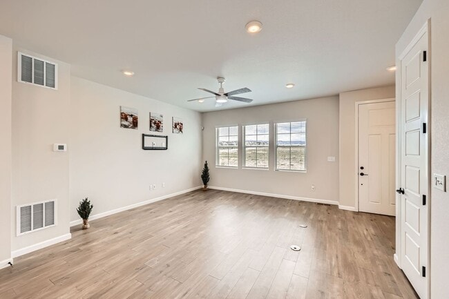 Building Photo - Evolve Real Estate: Available Immediately! Almost NEW Large 3 Bedroom in STERLING RANCH!