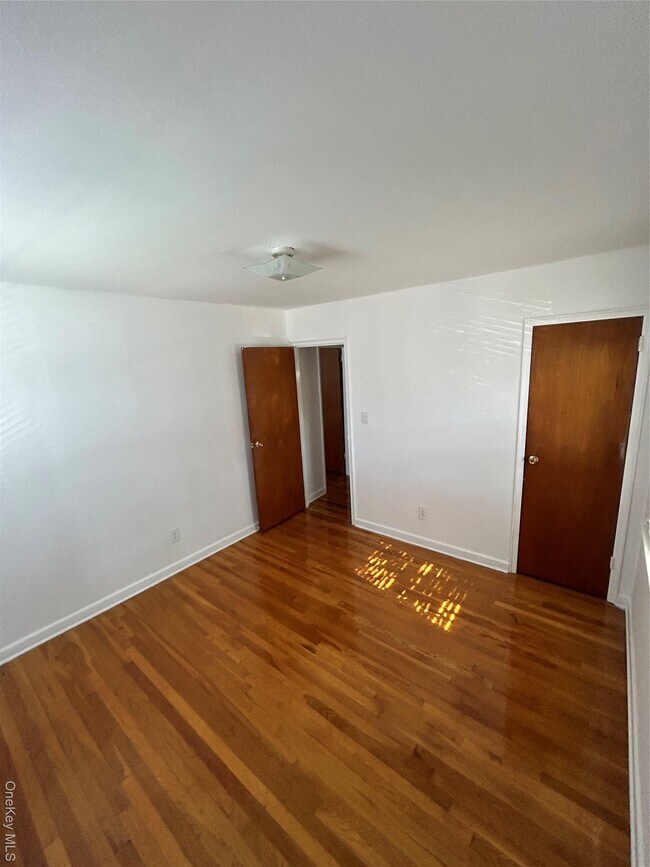 Building Photo - 60-46 69th Pl