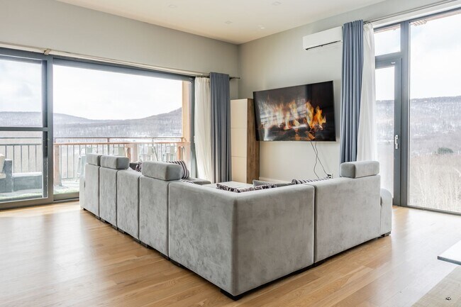 Building Photo - Modern Mountain Retreat with Rooftop Hot T...