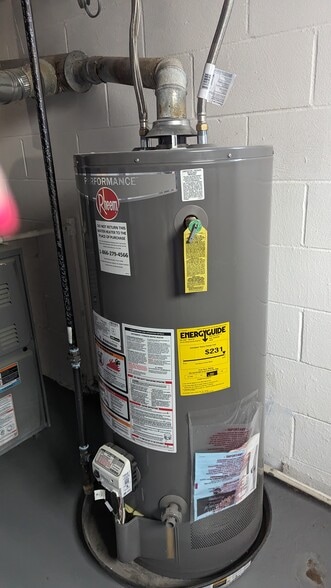 water heater new - 1407 E Valentine Cir NW