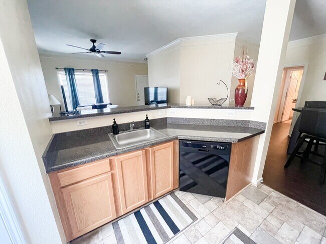 Building Photo - "Chic & Cozy Furnished 1-Bedroom Condo with Granite Charm and Poolside Relaxation in Bradenton!"