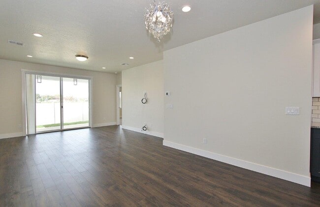 Building Photo - 5857 N Backfire Wy