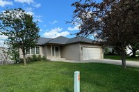 Building Photo - Update NW House New carpet throughout the ...