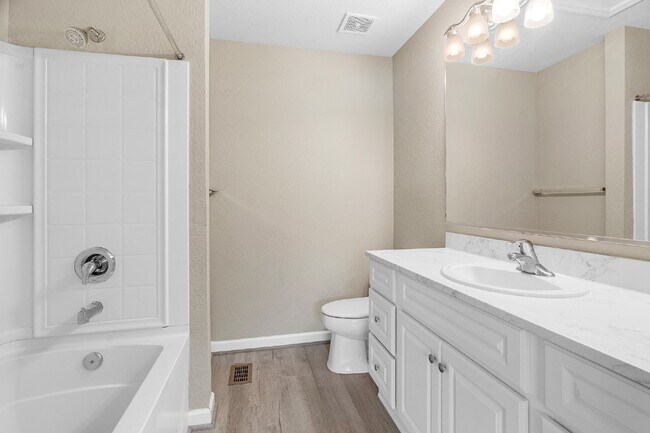 Building Photo - **NEWLY REMODELED ** MAINTENANCE FREE TOWNHOME/ NO APPLICATION FEES**