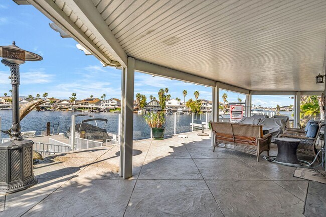 Building Photo - INCREDIBLE LOCATION... END OF CUL DE SAC WITH OVER 100 FEET ON WATER... MARVELOUS DOCK AND DECK W...