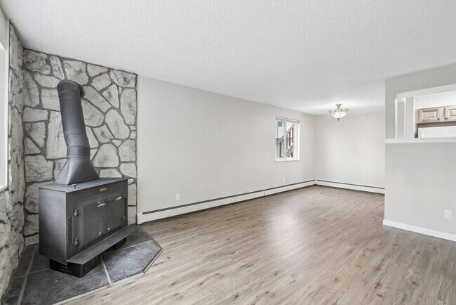 Building Photo - Townhome-Style Living with Greenbelt Views, Attached Garage & Community Pool!