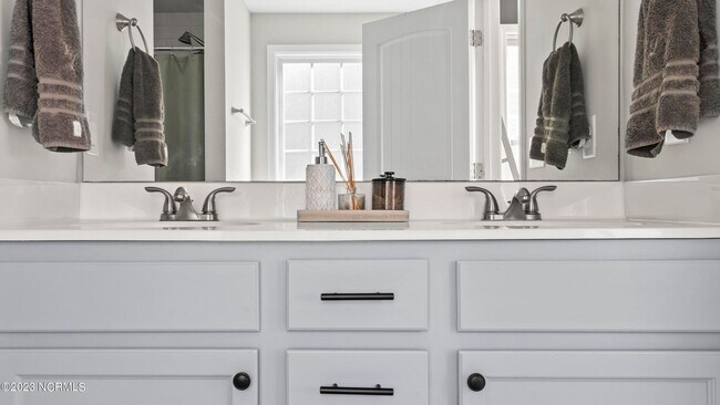 Building Photo - 4BR Home in The Landing at Mill Creek | Bonus Room + Fenced Yard w/ Pergola