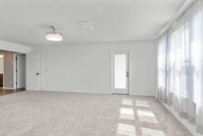 Building Photo - Discover luxury living in the gated Whispe...