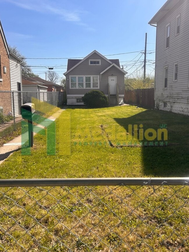 Building Photo - Spacious 1-Bedroom Single-Family Home with Large Fenced Yard