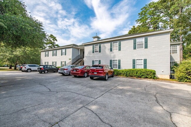 Building Photo - Coastal Comfort Awaits: *FULLY FURNISHED* ...