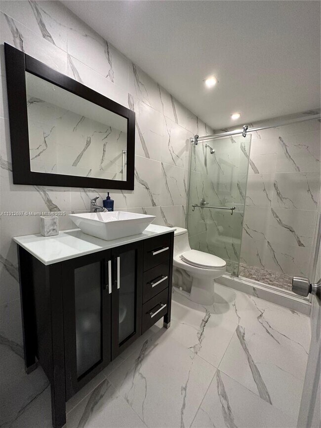 Building Photo - 19380 Collins Ave