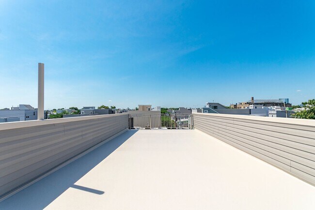 Building Photo - Three Bedroom Point Breeze Townhome w Roof Deck!