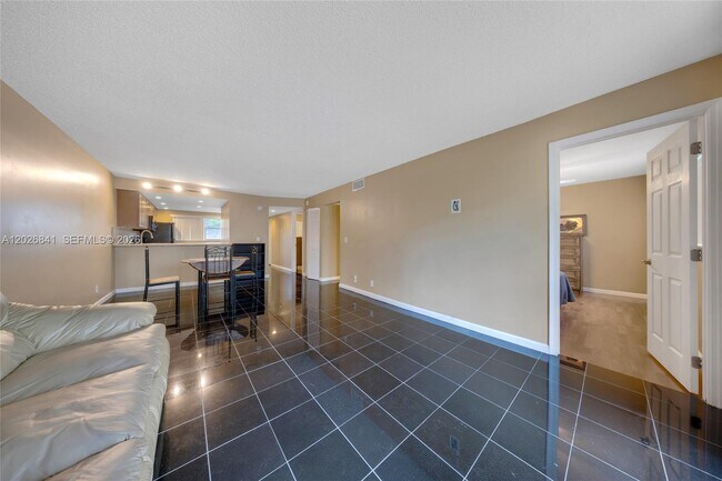 Building Photo - 6075 N Sabal Palm Blvd