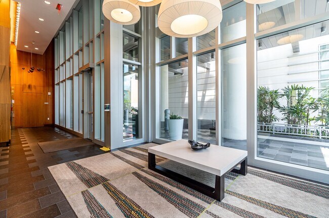Building Photo - Stylish 1-Bedroom Unit at THE COLLECTION w...