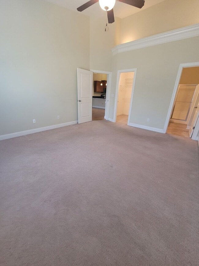 Building Photo - This 3 bedroom 2.5 bath brick townhouse with one car garage is located in Westgate Shoreline subd...