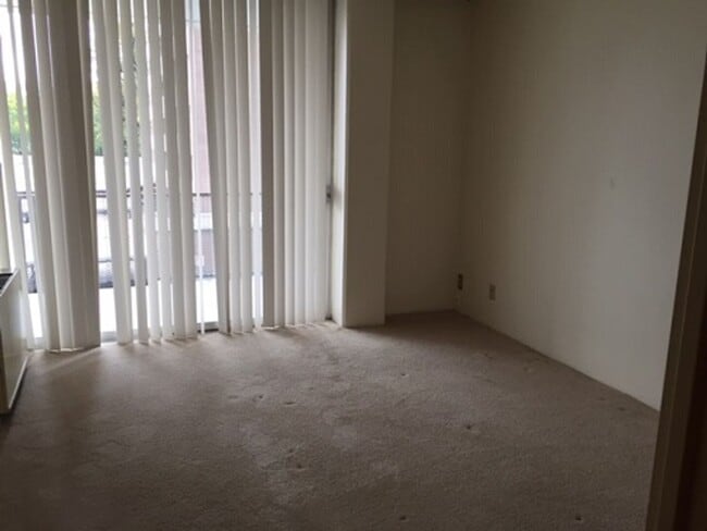 Building Photo - Secure One-Bedroom Condo Near CSU with Premium Community Amenities