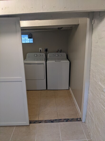 Laundry in basement half bath - 1528 Olive St