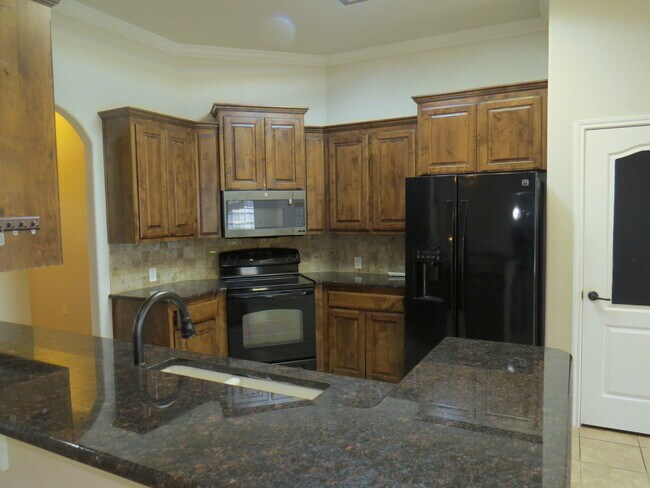 Building Photo - "Spacious 4-Bed Oasis in Killeen with Granite Touches & Cozy Fireplace!"