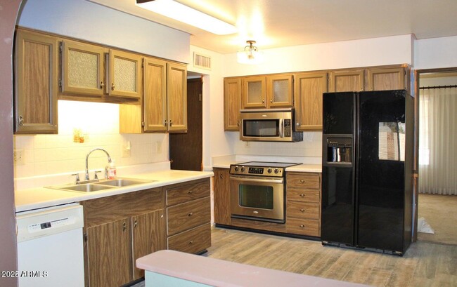 Building Photo - 9814 W Azalea Ct