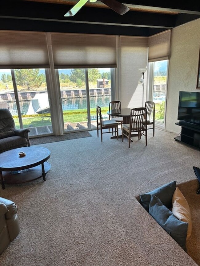 Building Photo - Condo with beautiful channel views and boat slip available for a Winter or Summer seasonal 3-6 mo...