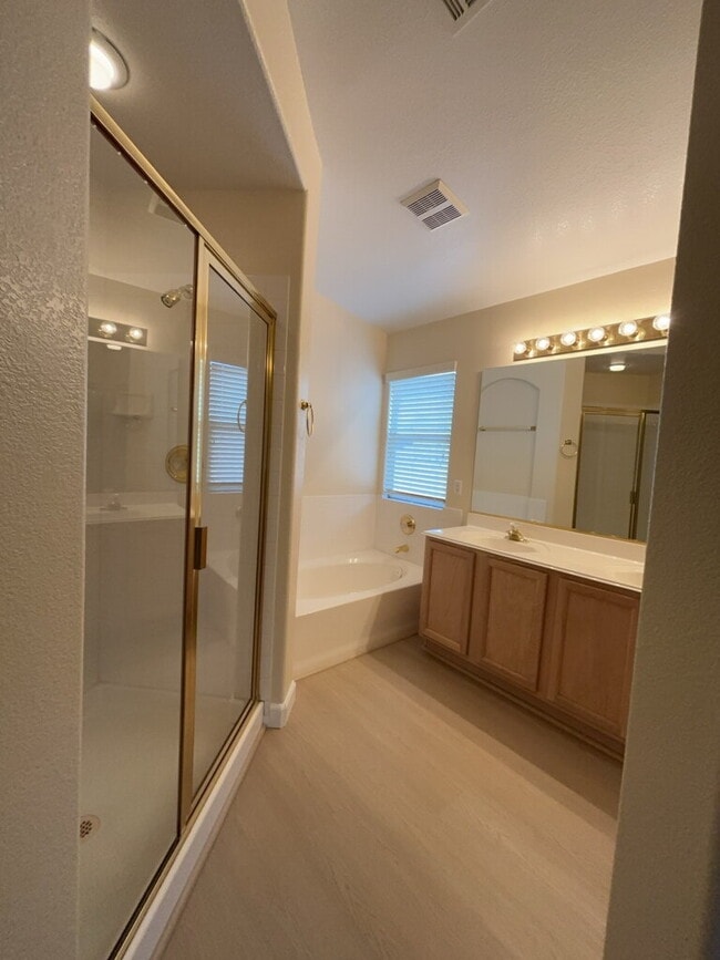 Building Photo - This beautiful two-story home is located in a gated community.