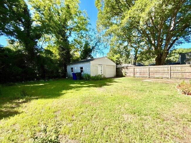 Building Photo - Cozy Home with Private Backyard & Detached...