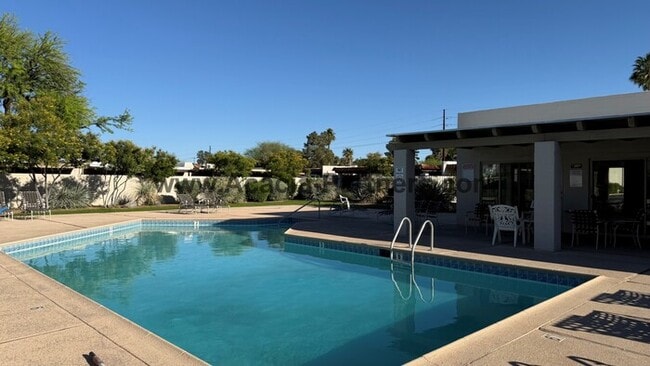 Building Photo - Three bedroom townhome with community pool