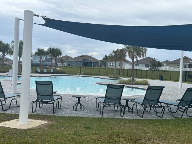 Building Photo - Brand New 4 bed inCypress Park - Haines City