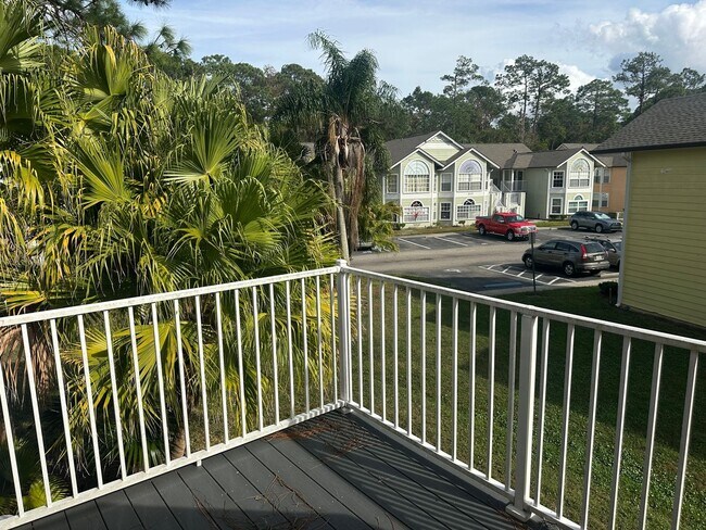 Building Photo - Spacious 3 bedroom condo, perfectly located near shopping & attractions!