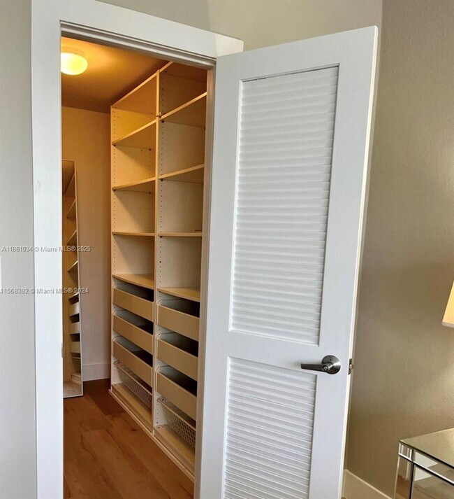 Building Photo - 10275 Collins Ave