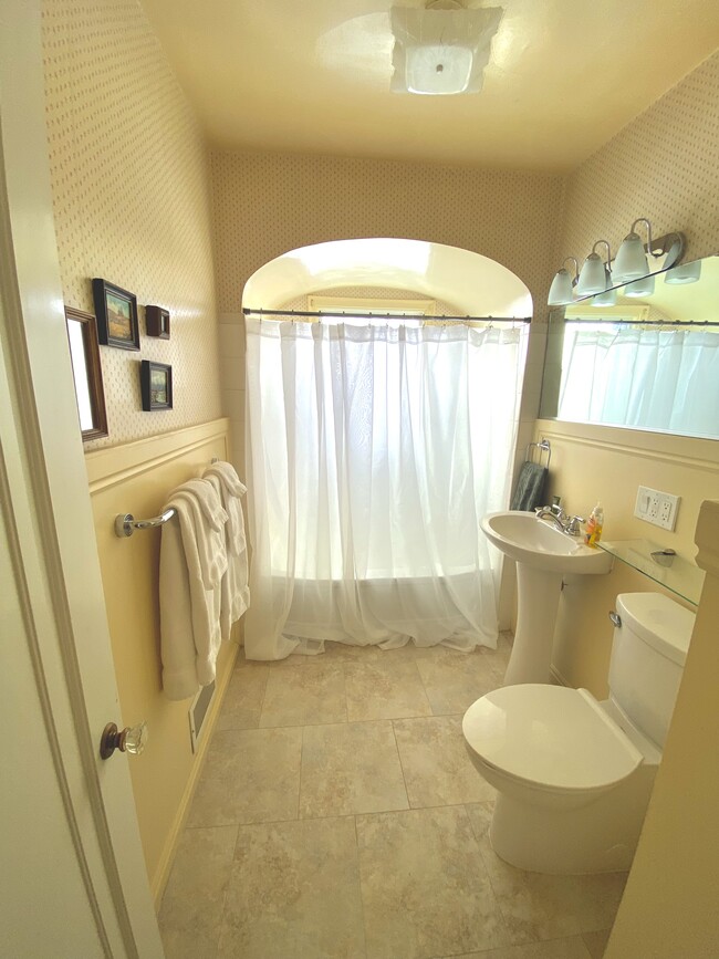 Upstairs Bathroom with custom arches. - 141 N 1st E