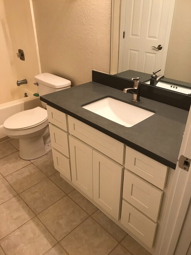 Building Photo - Remodeled 4 Bed Room 2 Bath 2 Car Garage Home