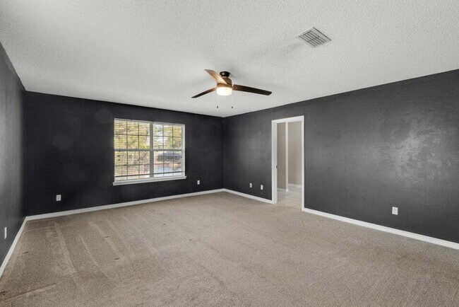 Building Photo - LAKE FRONT HOME & GATED COMMUNITY WITH COMMUNITY POOL IN NAVARRE!