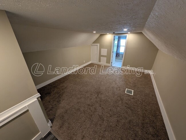 Building Photo - Updated 3-Bedroom Home with Private Upper Suite & Detached Garage