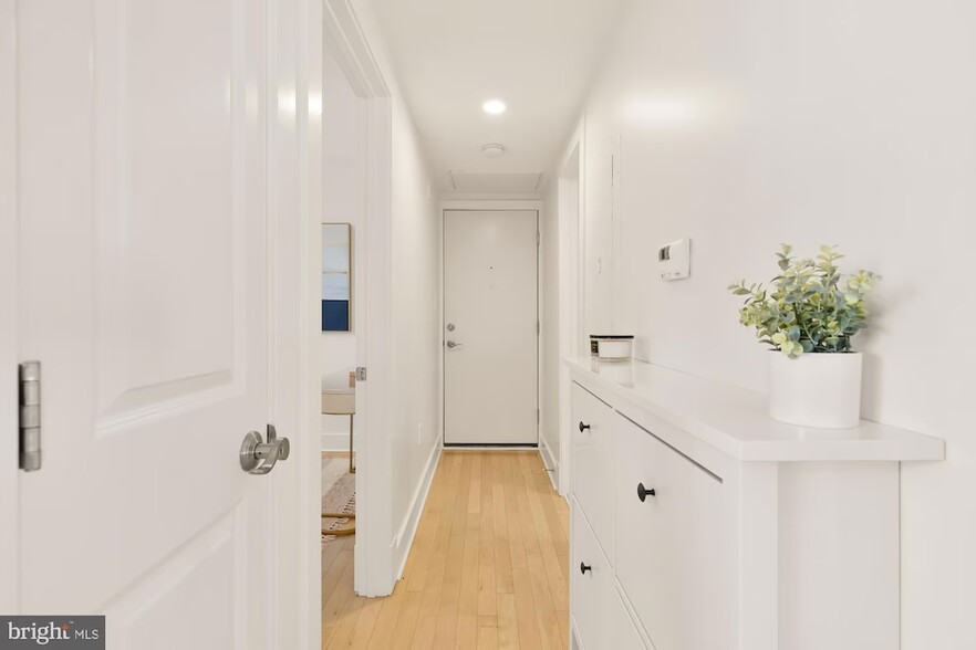 Entry hallway with view of door to unit - 1907 3rd St NW