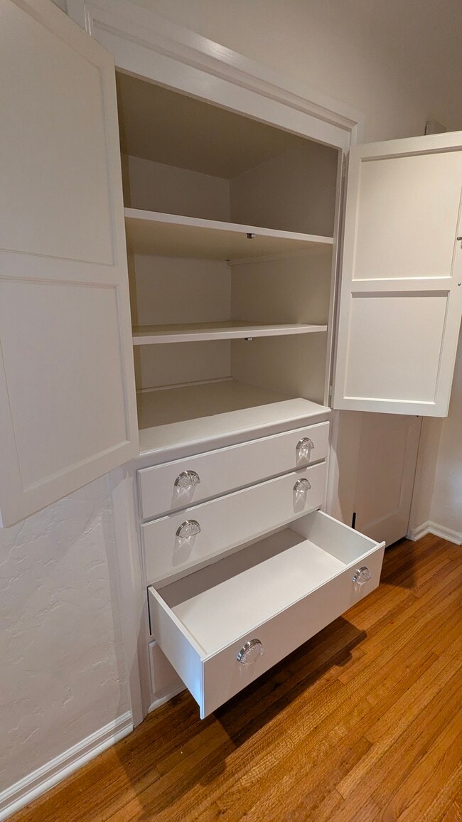 Hallway Linen Closet with Four Drawers Offers Abundant Storage - 1103 S Crescent Heights Blvd