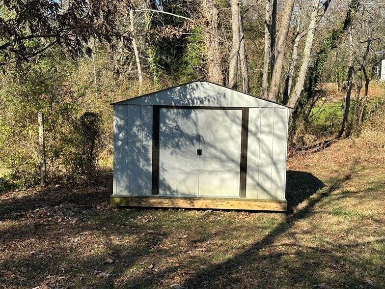 8x10 Storage Building in back yard - 184 Wickins Dr