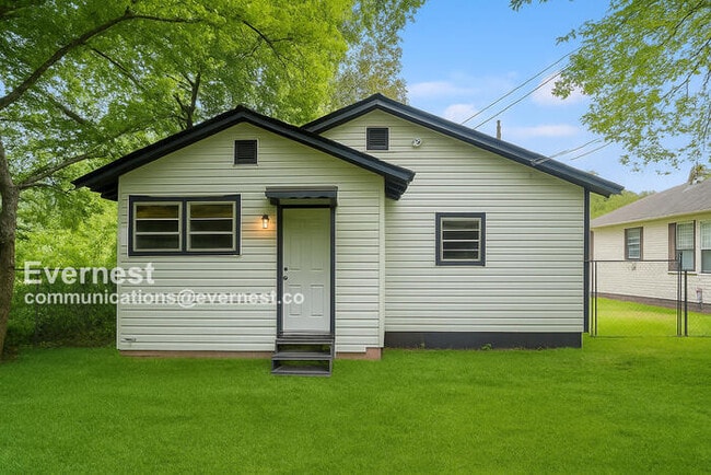 Building Photo - 1309 Woodland Ave SW